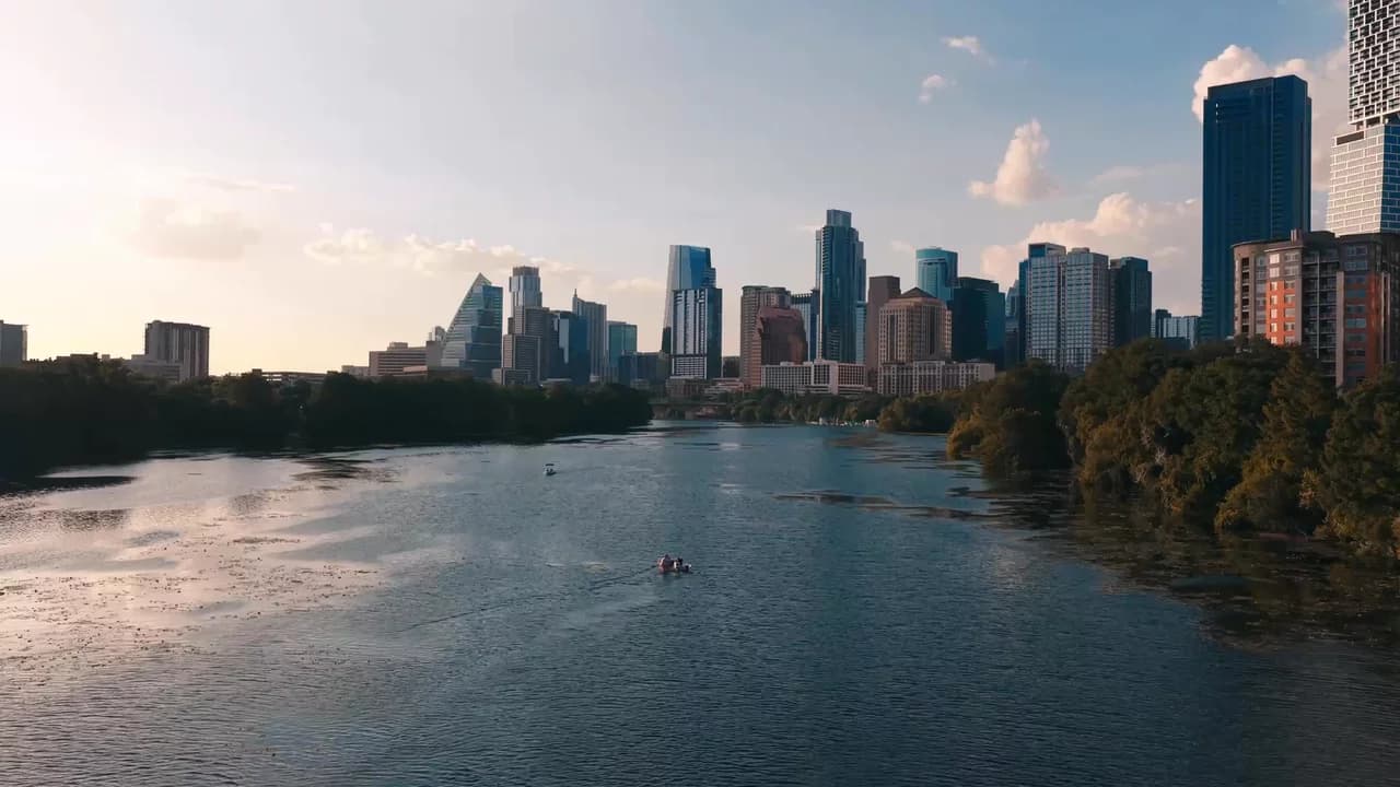 Austin skyline and Lady Bird Lake near The Travis